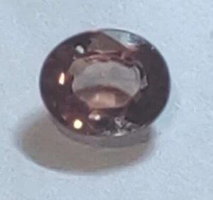Smooth! 1.09ct New 6.4x5.3x3mm Oval Cut Natural Tanzanian Orangey Pink Zircon! - Picture 1 of 3