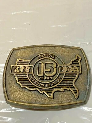De colección 1983 Kubota Tractor Company KTC 15 años EE. UU. hebilla de cinturón de latón  Foto 1 de 4