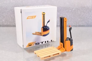JL857 Conrad #2775 1:25 Chariot Elevateur Still EGV12 Pallet Truck A+/a - Imagen 1 de 3