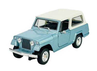 WELLY 1967 JEEPSTER COMMANDO STATION WAGON BLUE 1:24 DIE CAST METAL MODEL NEW  - Image 1 of 4