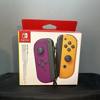 New Nintendo Switch Joy-Cons Pair HAC-015/HAC-016 Neon Purple/Neon Orange - Image 1 of 4