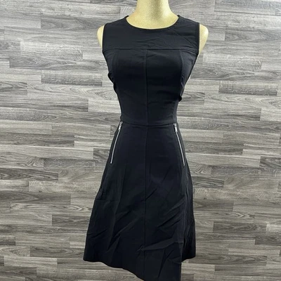 “NUEVO” Vestido Andrew Marc Flex Negro Sin Mangas Ajuste y Acampanado Talla 4 Bolsillo con Cremallera Foto 1 de 4