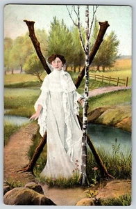 Postcard Woman In White Dress by Water with Large "X" Tree - Picture 1 of 3