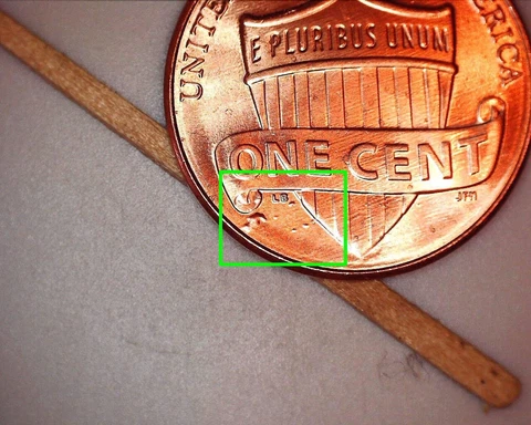 2014 D Penny Error - Several Die Chips on the Reverse Under the Shield Cover