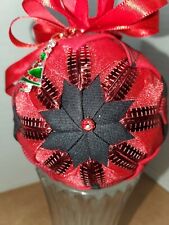 ORNAMENT FABRIC MADE WITH RED RIBBON W BUFFALO PLAID FABRIC AND CHRISTMAS CHARM
