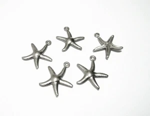 10pz ciondoli stella marina in acciaio inox colore argento scuro 17x15mm bijoux - Foto 1 di 1