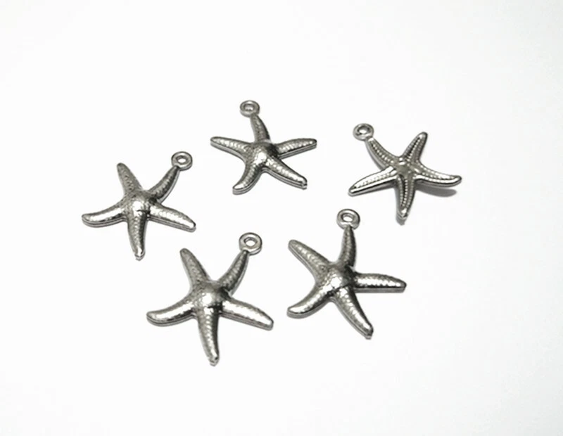 10pz ciondoli stella marina in acciaio inox colore argento scuro 17x15mm bijoux - Immagine 1 di 1