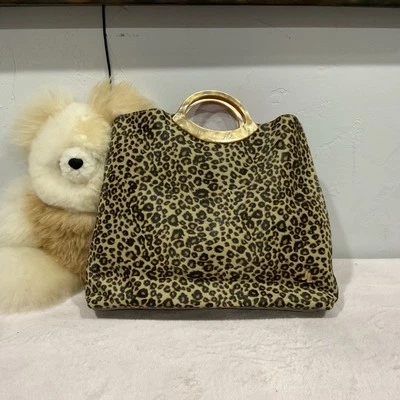 Bolso sin asas Jeanne Lottie estampado de leopardo con asa Lucite Foto 1 de 4