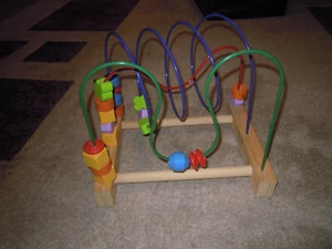 Motorikschleife/Lernspielzeug aus Holz mit drei verschiedenen Schleifen Top!!! - Bild 1 von 3