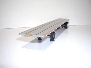DCP FIRST GEAR 1/64 BLACK FRAMED SILVER DECKED TANDEM AXLE 48' UTILITY FLATBED - Picture 1 of 5
