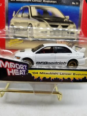 Johnny Lightning 04 Mitsubishi Lancer Evolution Street Freaks Import Heat  - Image 1 of 4