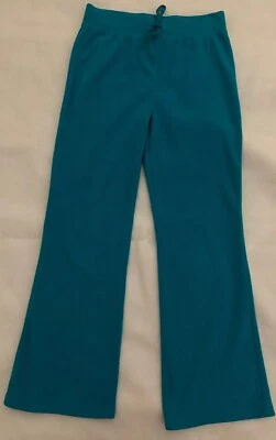 Pantalones elásticos de terciopelo azul circo usados en excelente estado talla 10-12 Foto 1 de 4