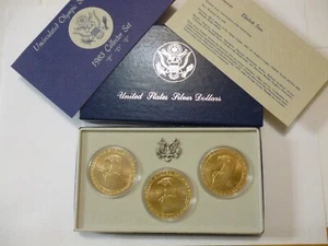 1983 US Olympic silver dollar set. Collector set P D S. Set of 3 coins toned - Picture 1 of 19