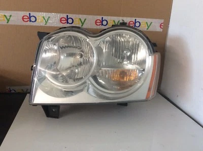 Faro izquierdo Jeep Grand Cherokee 2005 2006 2007 fabricante original  Foto 1 de 2