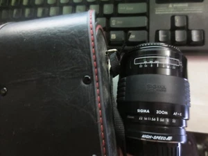 Sigma Zoom-k Auto Focus 70-210mm f4-5.6 Zoom Lens w 1 Cap & Canon Mount - Picture 1 of 4