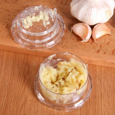 Trituradora de ajo multifuncional de cocina, trituradora manual de rollos de prensa de ajo Foto 1 de 4