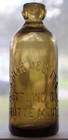 Butte Montana North Western amber colored Emb Hutchinson bottle Hutch MT 0031 