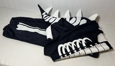 Disfraz de esqueleto de dinosaurio Pottery Barn para niños que brilla en la oscuridad 7/8 leer por favor Foto 1 de 4