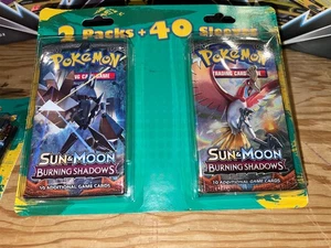 Pokemon Sonne & Mond Brennende Schatten 2 Packungen Blister mit Sleeves Neu - Bild 1 von 6
