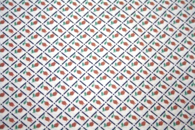 ORANGE FLOWERS IN NAVY DIAMONDS BY jOAN KESSLER - 100% COTTON FABRIC - Image 1 of 3