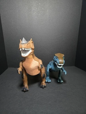 Kidplokio Juego de 2 Juguetes Dinosaurios T Rex Marrón y Azul con Luces LED, Sonidos  Foto 1 de 4