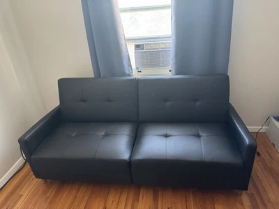 Sofá futón Ashley Furniture Andora - sofá cama de cuero sintético negro como Foto 1 de 3