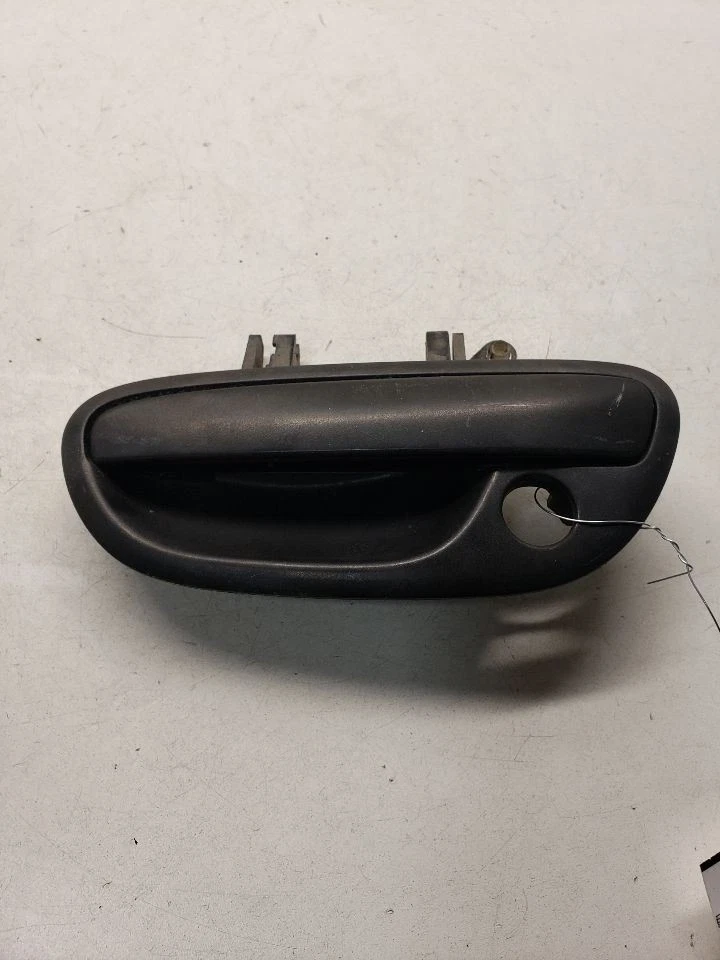 Manija de puerta del conductor montaje exterior puerta moldeada negra se adapta a 05-06 BAJA 1445333 Foto 1 de 4