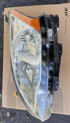 Faro izquierdo Nissan Sentra 2013-2015 lado del conductor OEM Hella 26060-3SG2A Foto 1 de 4