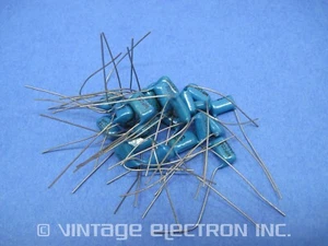 (25) Condensatori radiali a film metallizzato in policarbonato: 0,056uF 5% 250V - Foto 1 di 7