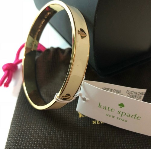 Bracciale Kate Spade tono oro e bianco NUOVO