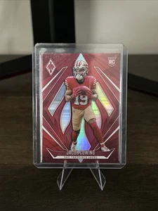 2024 Panini Phoenix - Rookies Jacob Cowing #186 Rosso /99 (RC) - Foto 1 di 2