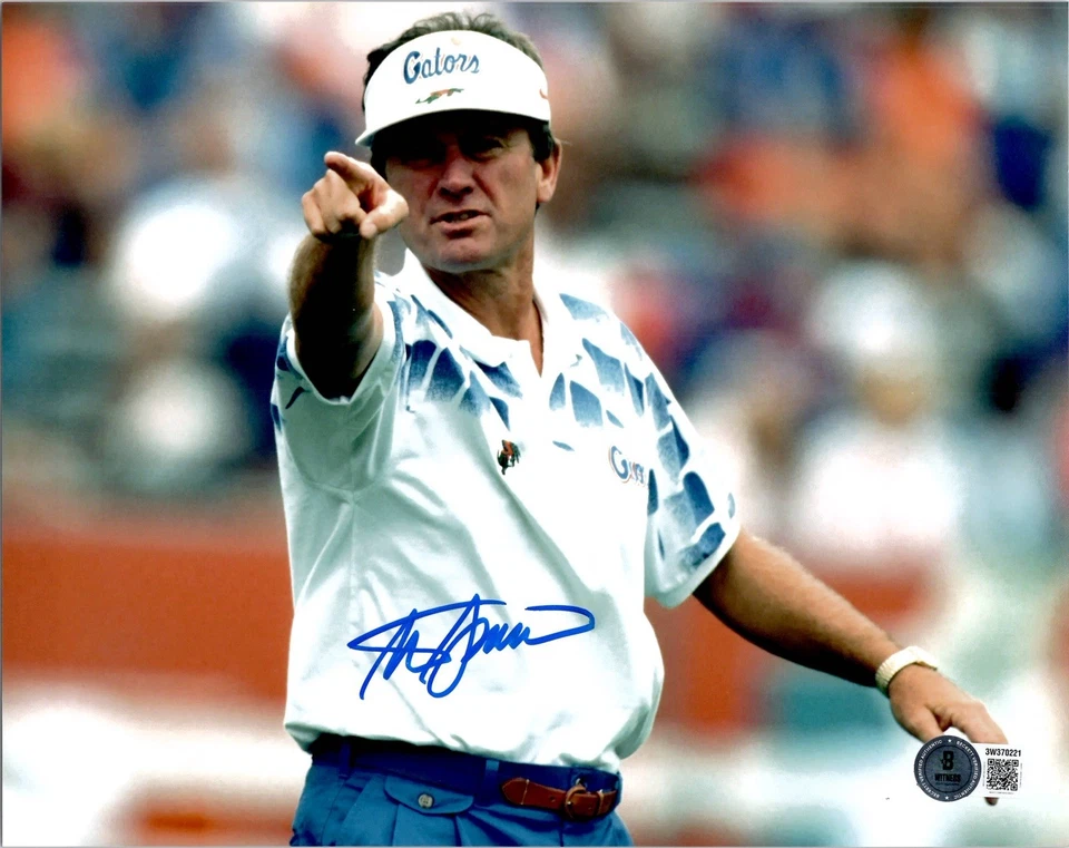 STEVE SPURRIER SIGNED AUTOGRAPH 8X10 PHOTO FLORIDA GATORS HEISMAN BECKETT COA - Image 1 of 1