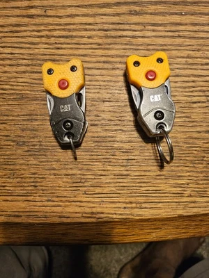 2 destornilladores de cuchillo multiherramienta CAT abrebotellas linterna ‎Caterpillar 8820-O Foto 1 de 4