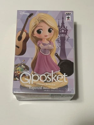 Estatuilla Rapunzel con Vestido Rosa Dije de Chica - Qposket de Bandai Foto 1 de 4