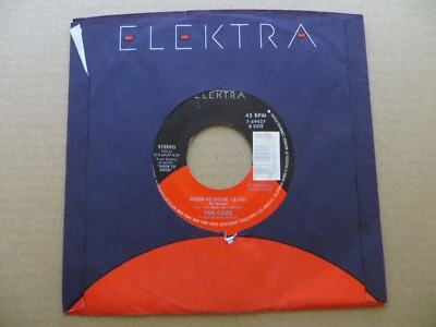 The Cars – Strap Me In / Door To Door - 1987 - Elektra 7-69427 7" Single VG+ - Image 1 of 4