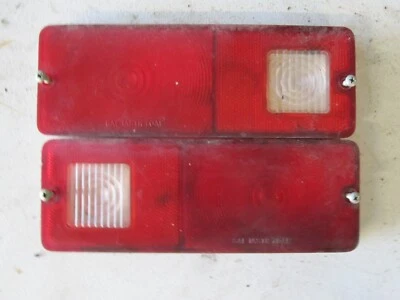 AMC GREMLIN X TAILLIGHT LENSES OEM LH RH PAIR W/ SCREWS NICE SET - Image 1 of 2