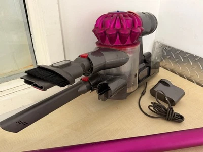 Dyson Cordless Vacuum Cleaner Grey Pink Handheld Bagless with Charger - Image 1 of 4
