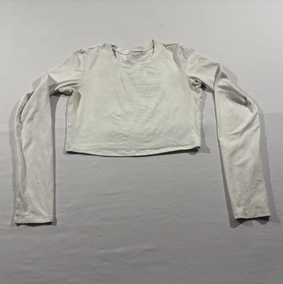 Top corto ALO Yoga para mujer blanco manga larga mezcla de polietileno gimnasio ropa deportiva talla M manchas Foto 1 de 4