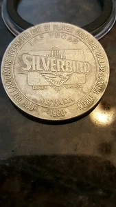 1980 SILVERBIRD CASINO 1.00 TOKEN (CASINO CLOSED) - Picture 1 of 2