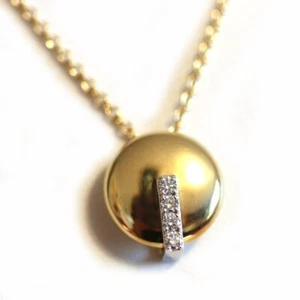 Collana con ciondolo tondo ROBERTO COIN NUOVA in oro giallo e bianco 18 kt con diamanti - Foto 1 di 16