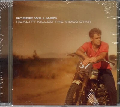 Robbie Williams - Reality Killed The...(1CD) Neu & OVP - Bild 1 von 2