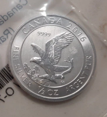 EAGLE 1/2 OZ SILVER 99.99 FINE - STILL IN APMEX WRAP - Image 1 of 4