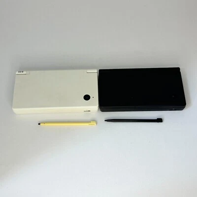 Lot of 2 Nintendo DS i black & white console with stylus pen tested from JAPAN - Image 1 of 4