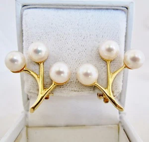 Pendientes de clip de oro amarillo de 14K con perlas blancas de 7,25 mm (7,1 gramos, 0,975") - Imagen 1 de 12
