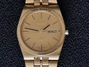 SEIKO 9923 8000 TWIN QUARZ UHR CHAMPAGNER GOLD ZIFFERBLATT SS ARMBAND EIN VINTAGE KLASSIKER - Bild 1 von 10