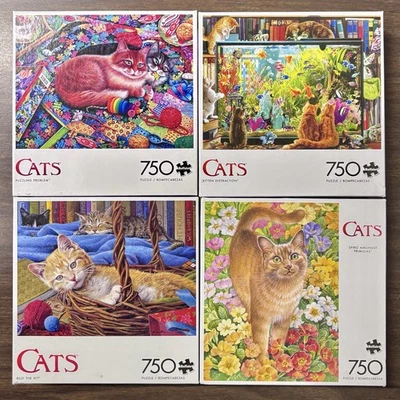 Lot of 4 Buffalo 750 Piece Cat Themed Puzzles Orange Tabby - Image 1 of 2