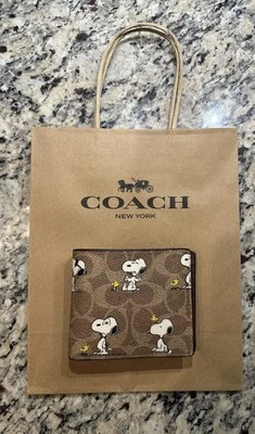 NWT Coach X Peanuts 3-In-1 Wallet In Signature Canvas w/ Snoopy Woodstock Print - Image 1 of 4