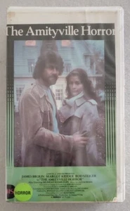 THE AMITYVILLE HORROR VHS 1983 Warner Home Video Clamshell Big Box Horror RARE - Picture 1 of 4