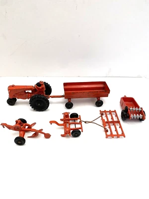 Hubley Minneapolis Moline Tractor Red 5.5" Diecast Metal with farming tools - Image 1 of 4