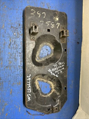 NOS 1970 CHEVROLET IMPALA BELAIR BISCAYNE HEADLIGHT HOUSING BRACKET L.H. GM Left - Image 1 of 2